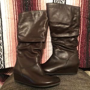 ALDO brown leather wedge boots.